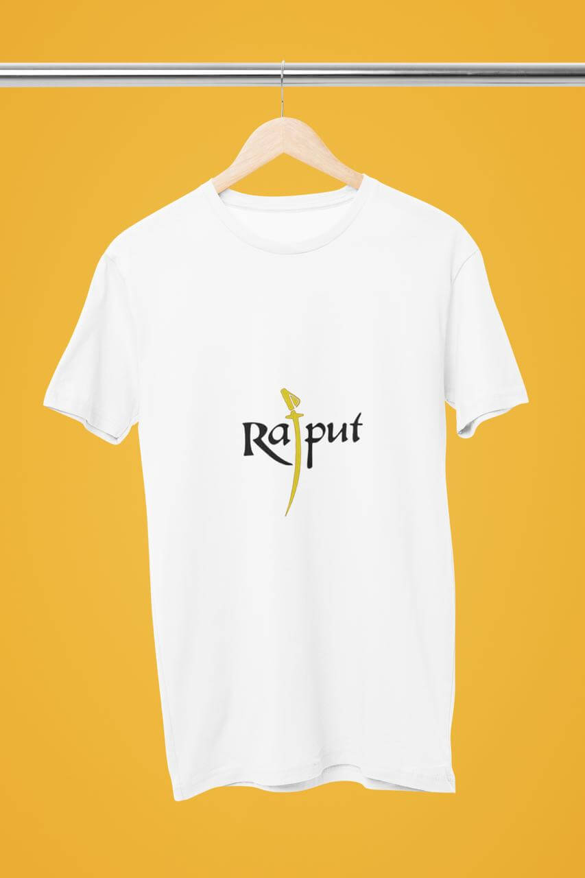 White Rajput Round Neck Tshirt with Celebrate Design, hanging on a wooden hanger against a yellow background