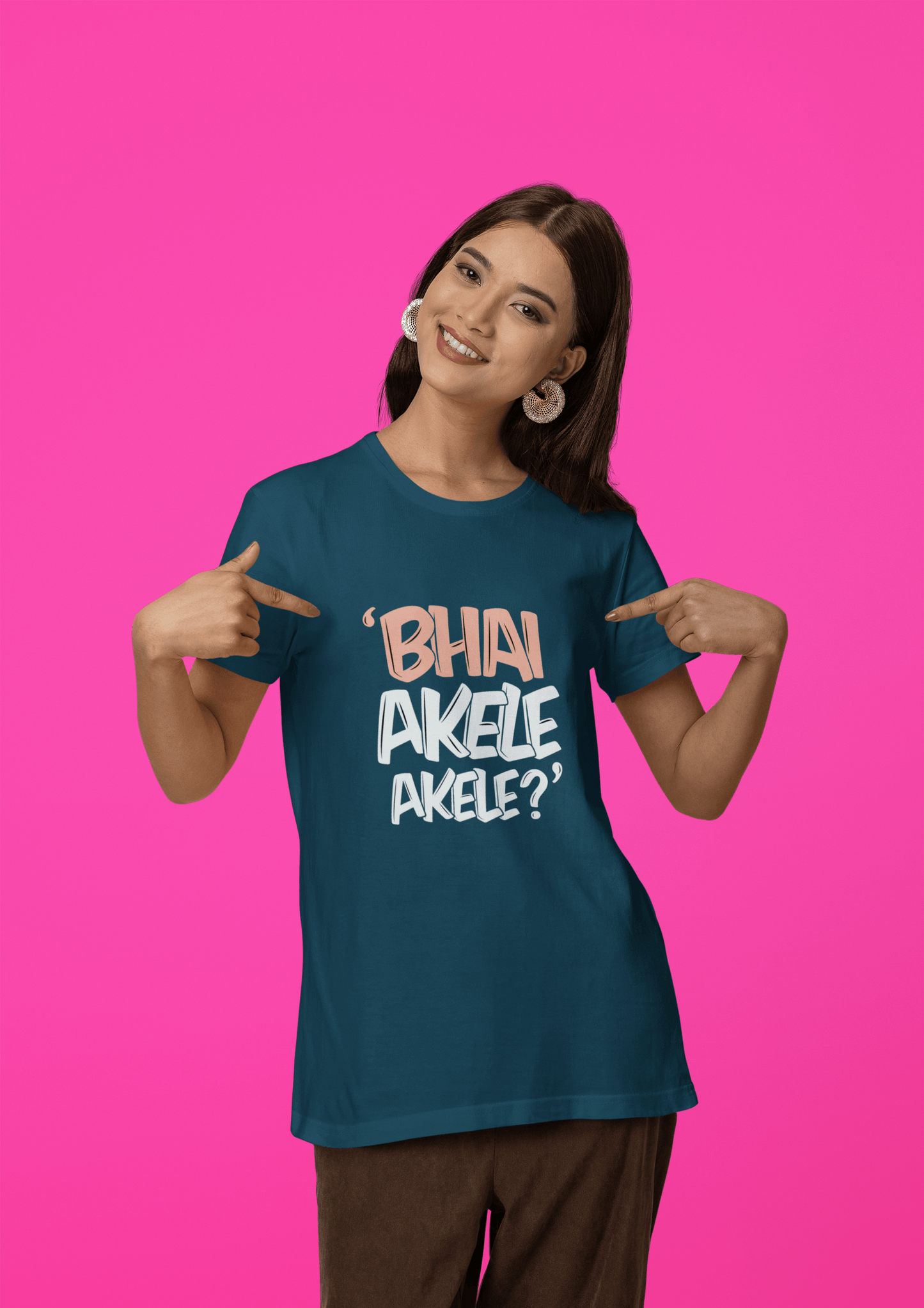 Woman wearing "Bhai Akele Akele" funky round neck t-shirt against pink background