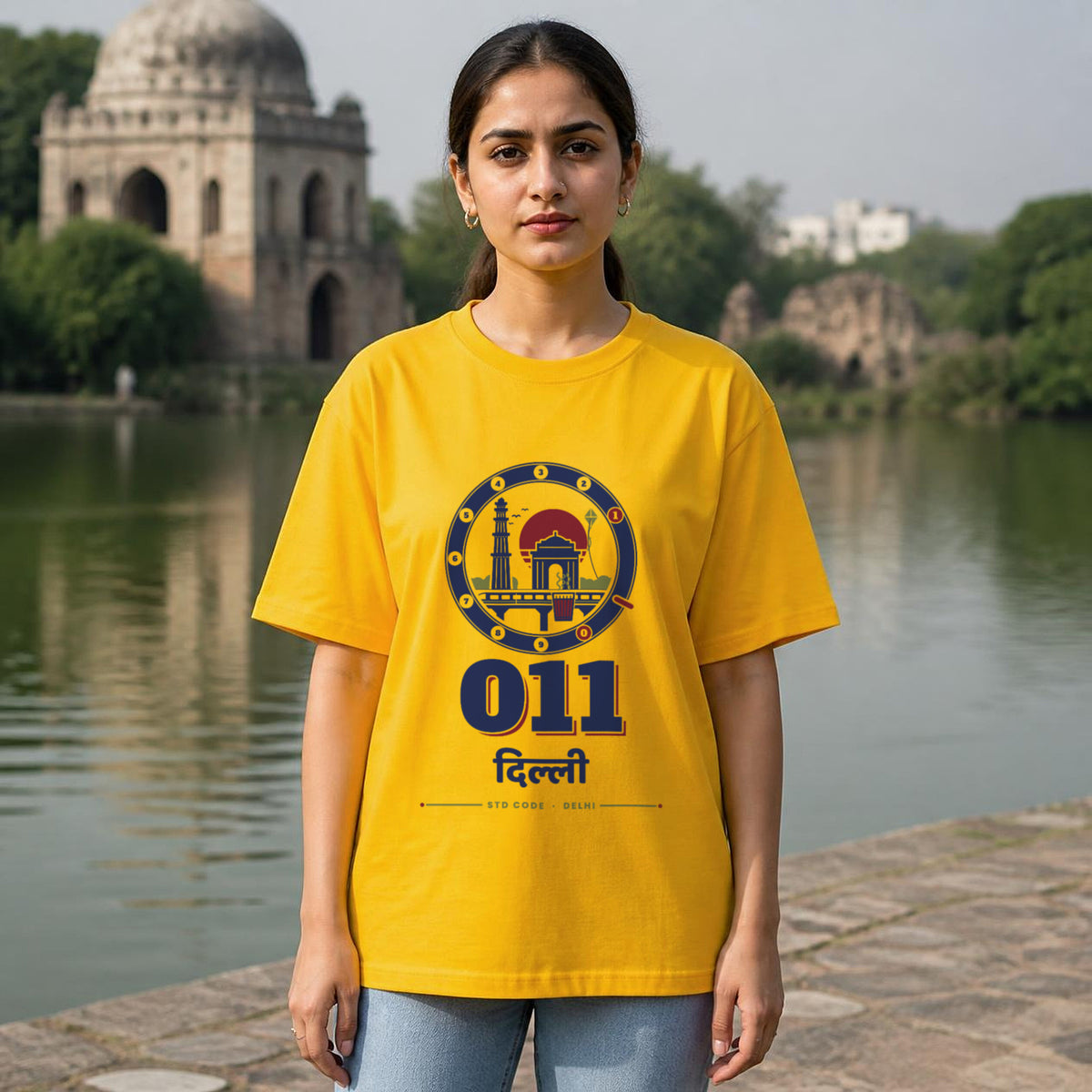 011 Dilli oversized cotton T-shirt in golden yellow, woman wearing it at Hauz Khas, Delhi – Bonzo Peter's