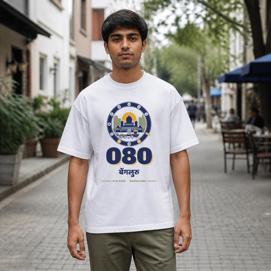 080 Bengaluru STD code oversized cotton T-shirt in white, men's front view on Church Street, Bonzo Peter's