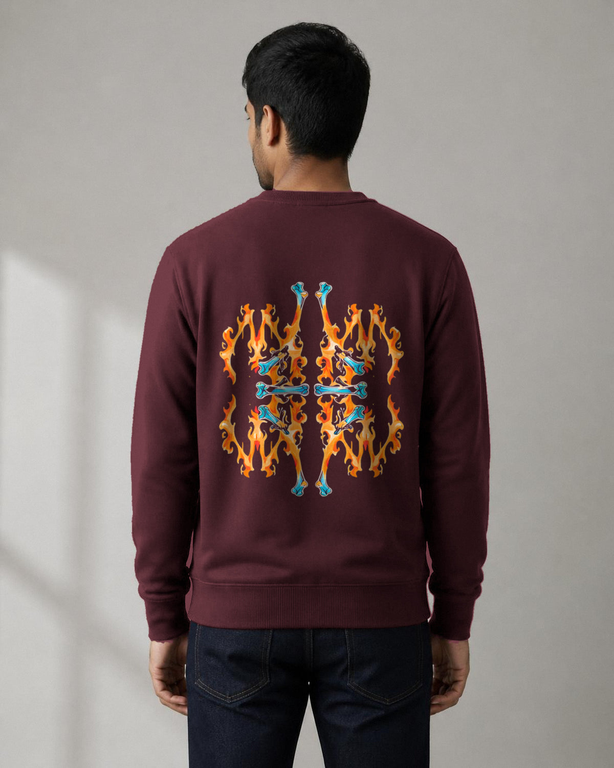 Fire Inside back print sweatshirt in Maroon worn by a model, Bonzo Peter's