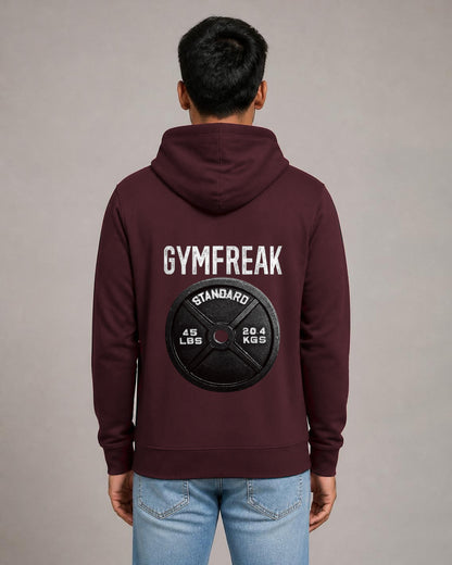 GymFreak back print hoodie in Maroon worn by a model, Bonzo Peter's
