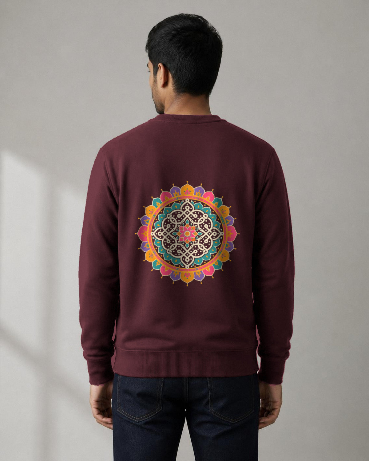 Kolam Mandala front and back print sweatshirt in Maroon worn by a model, back view, Bonzo Peter's