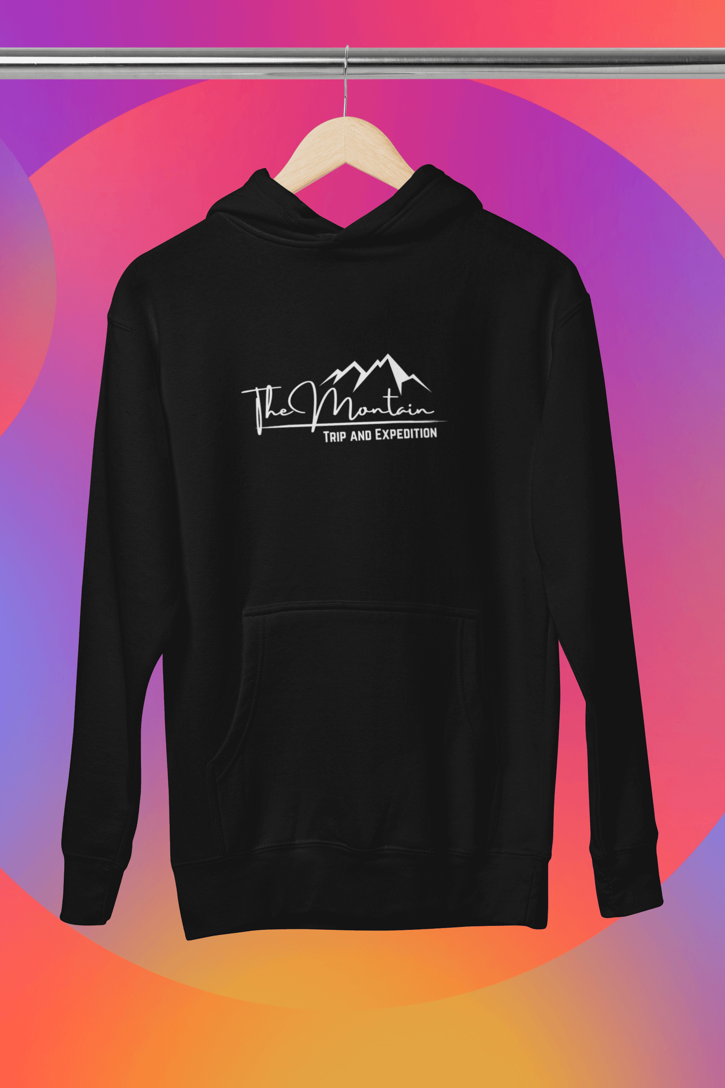Black hooded sweatshirt featuring "The Mountain" logo, perfect for casual wear and outdoor adventures.