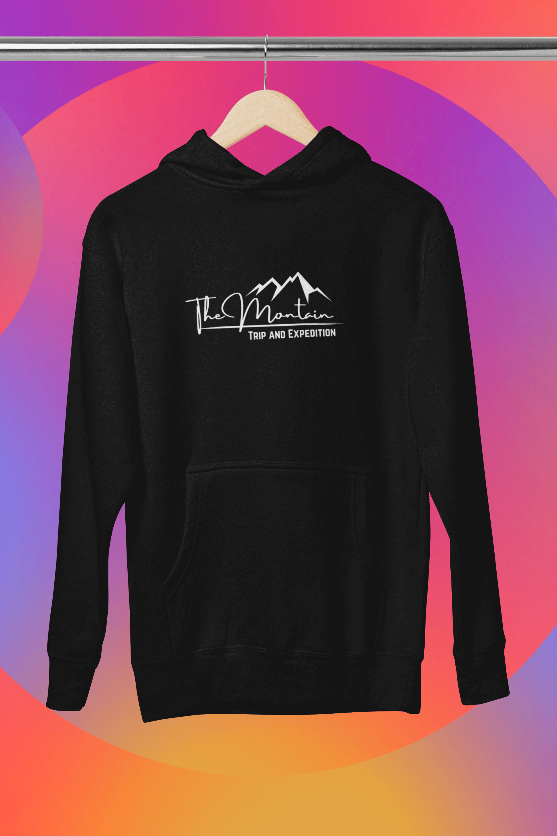 Black hooded sweatshirt featuring "The Mountain" logo, perfect for casual wear and outdoor adventures.