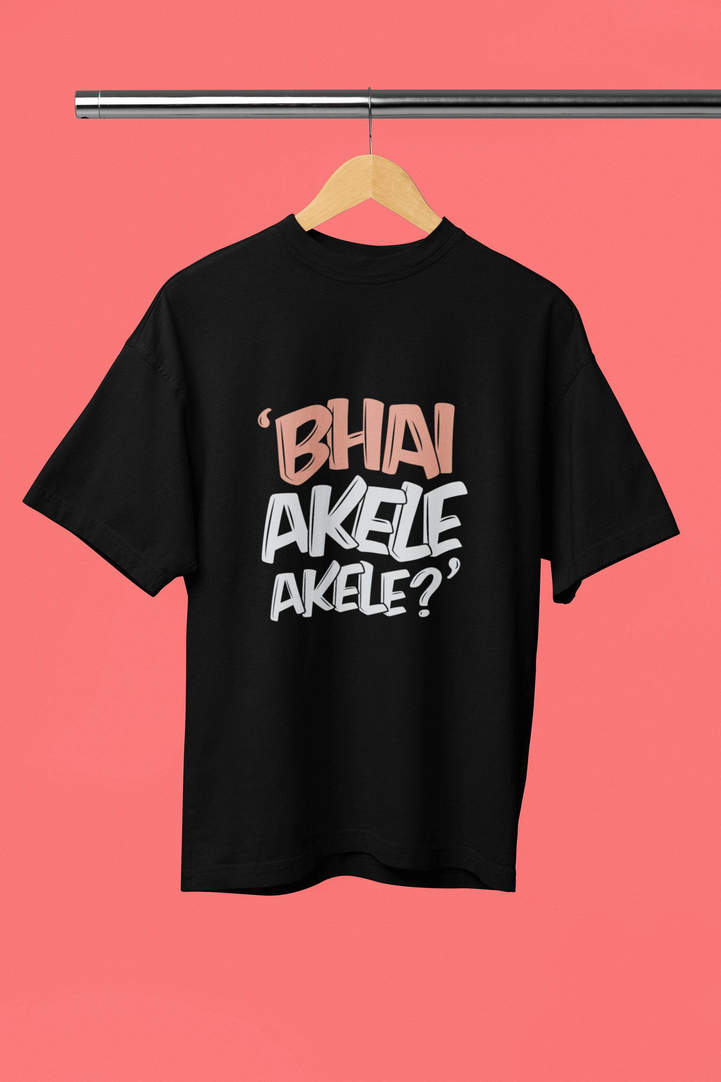 Black funky t-shirt with "Bhai Akele Akele" design hanging on a wooden hanger