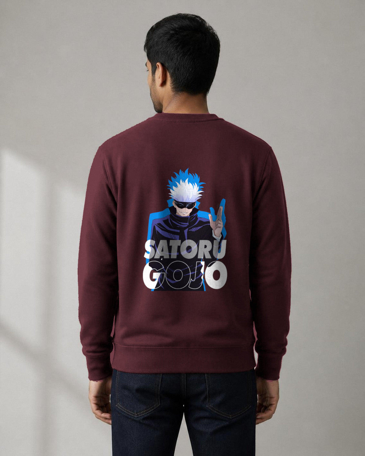 Satoru Gojo back print sweatshirt in Maroon worn by a model, Bonzo Peter's